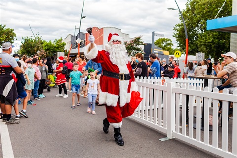 Santa walking down street