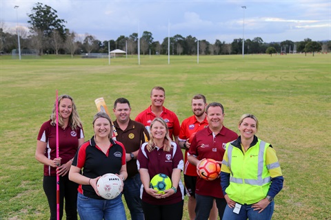 Katie Bell and representatives from Singleton local sporting clubs.jpg